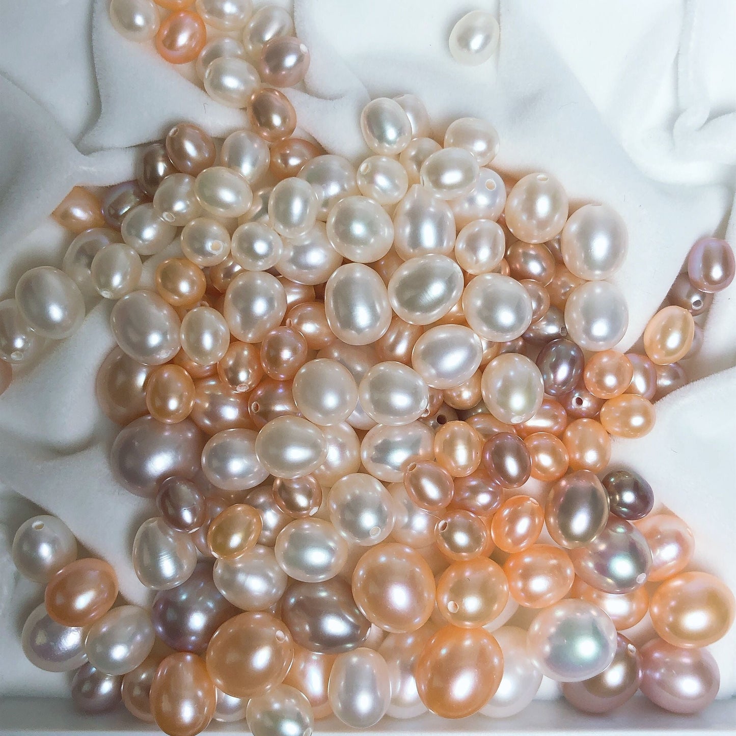 027.Teardrop pearls(9-11PCS)